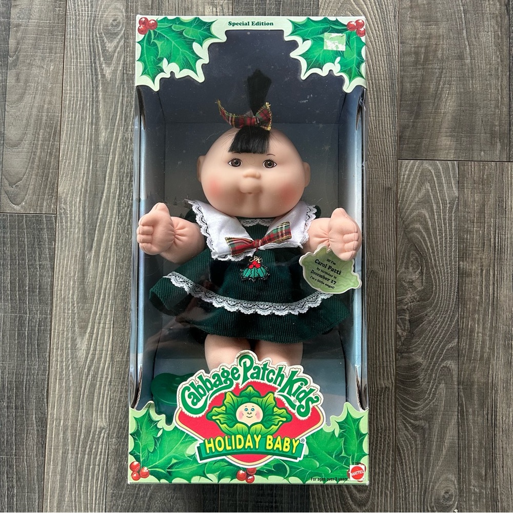 NRFB 1997 Mattel Cabbage Patch Kids Holiday Baby 
#17605
Carol Patti
December 17